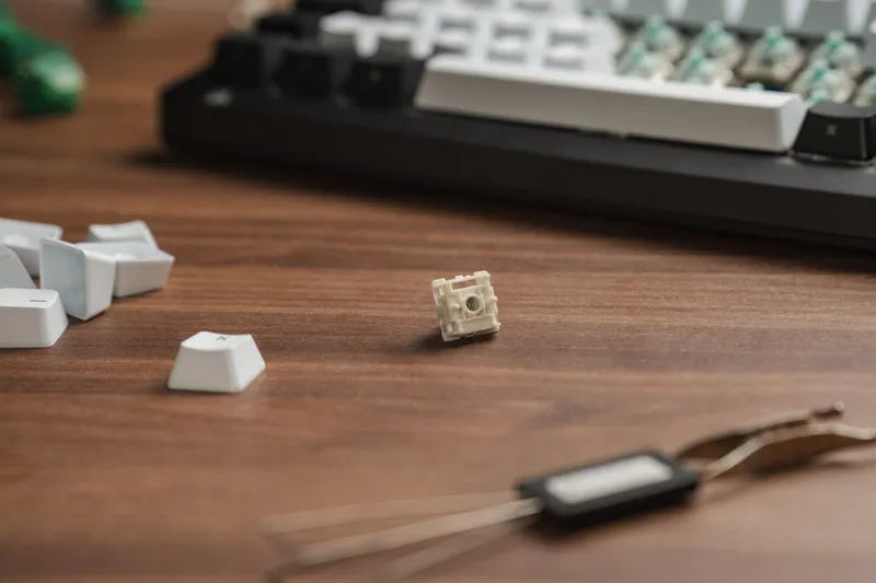 The same Corsair MGX Hyperdrive switch turned to show its housing and the hot-swap pins on the underside