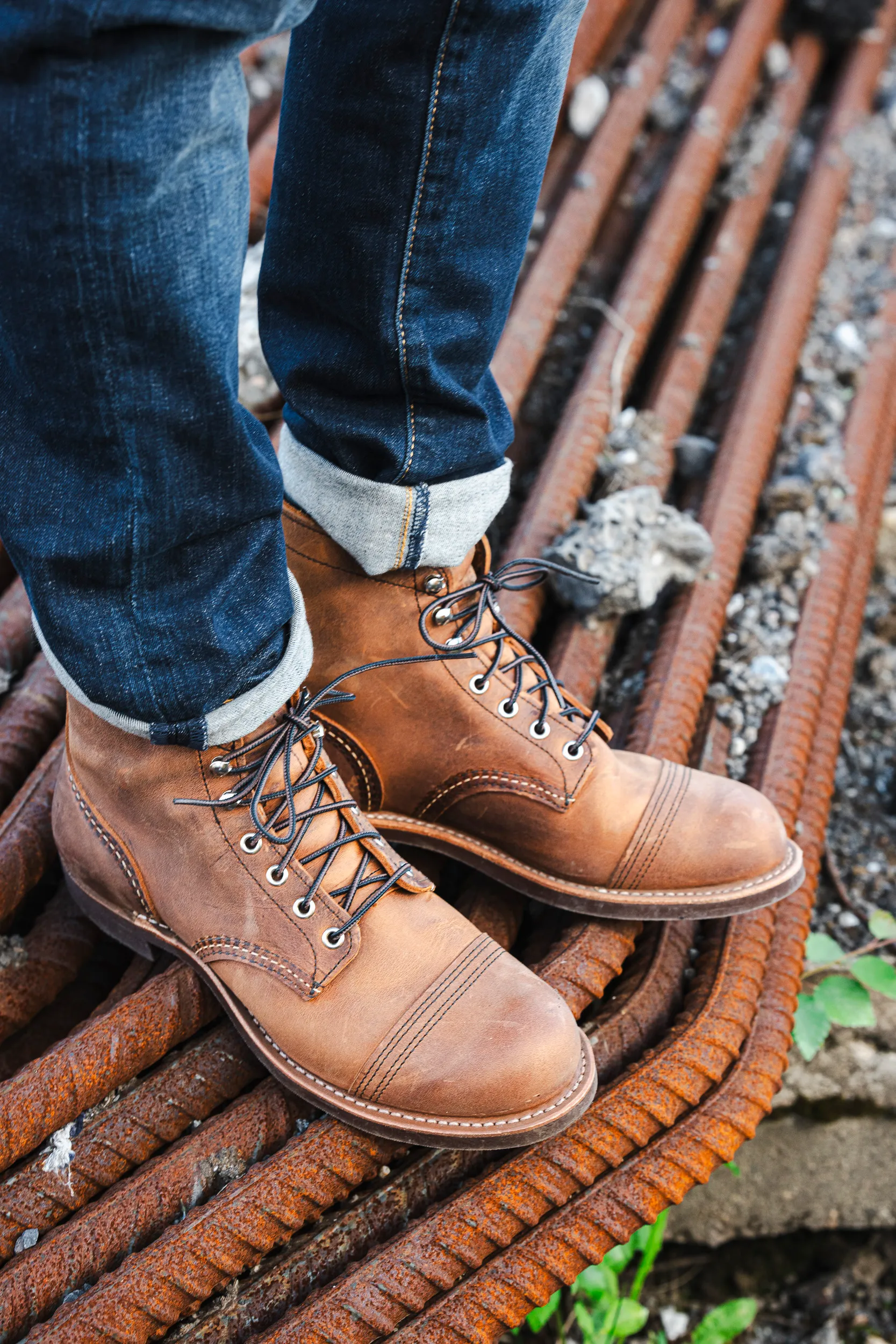Iron Rangers standing on metal bars