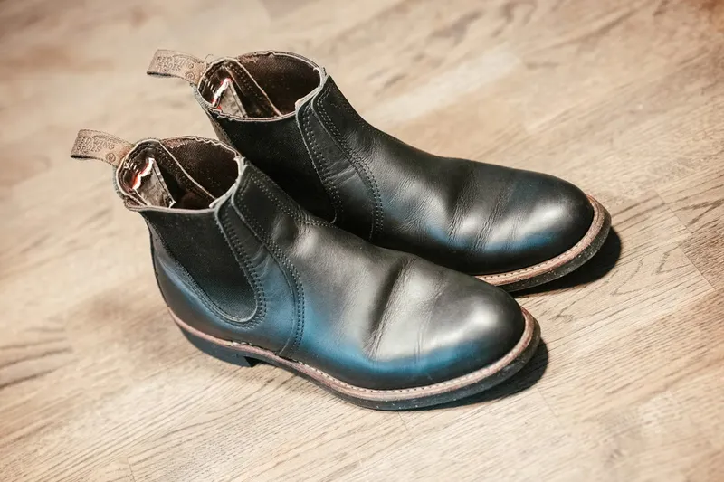 Red Wing Chelsea seen at an angle from above on a wooden floor