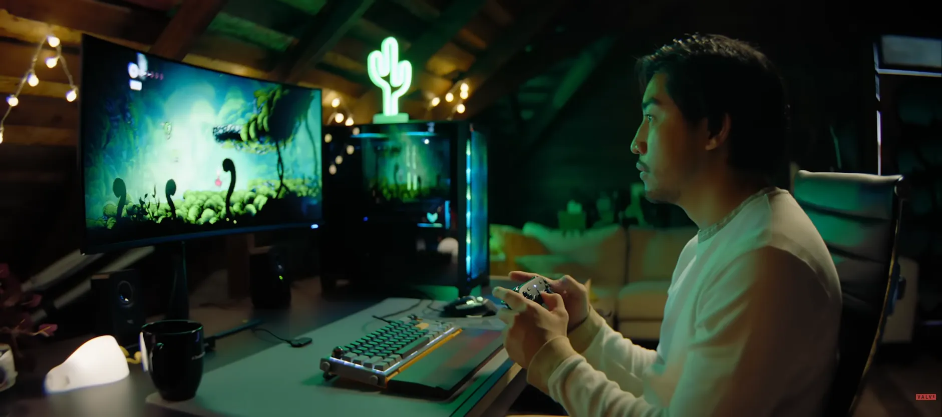 Person playing PC in a home studio with the Steam Controller