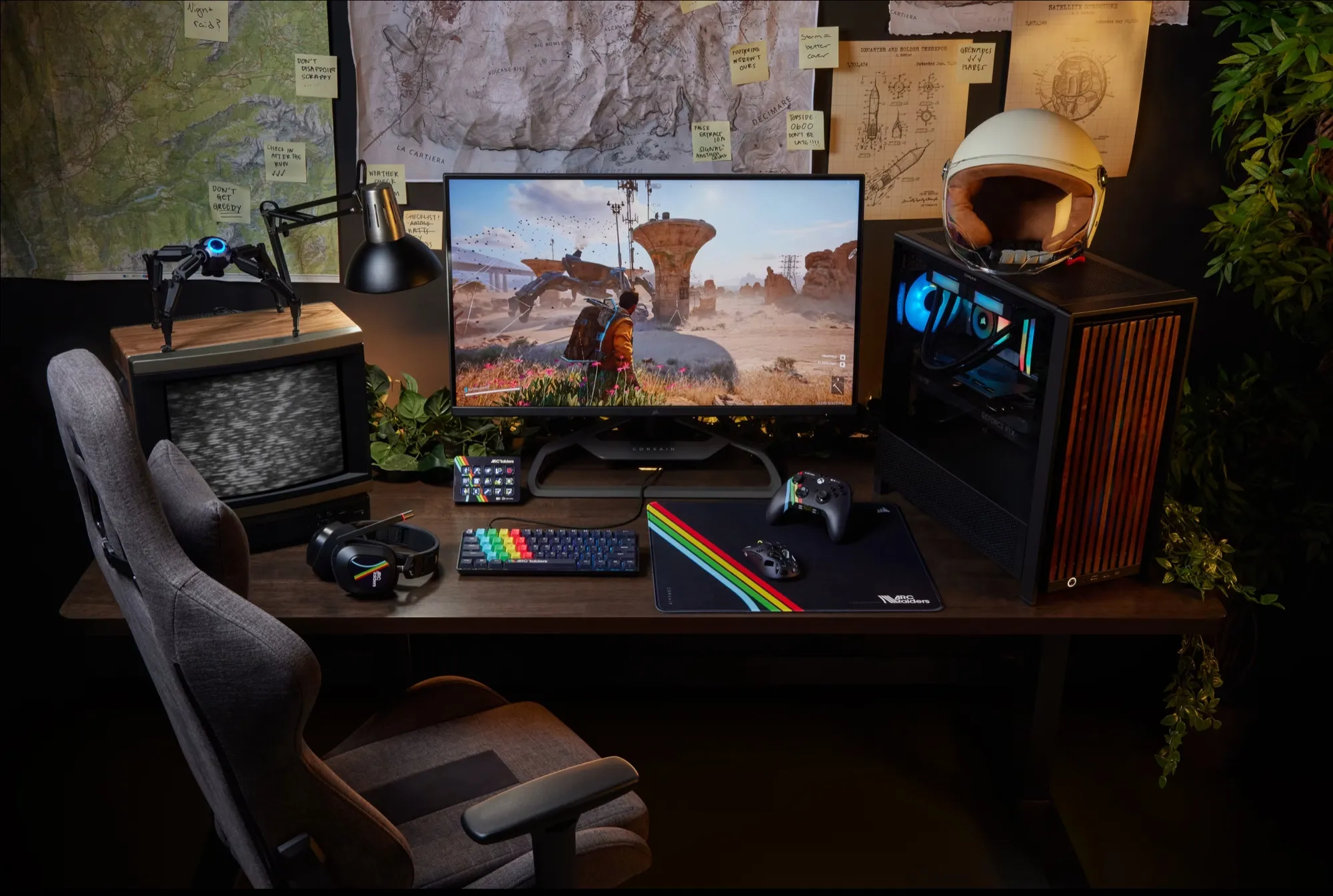 Desk with keyboard, mouse, headset, controller, Stream Deck and the black MM Large pad in Arc Raiders design