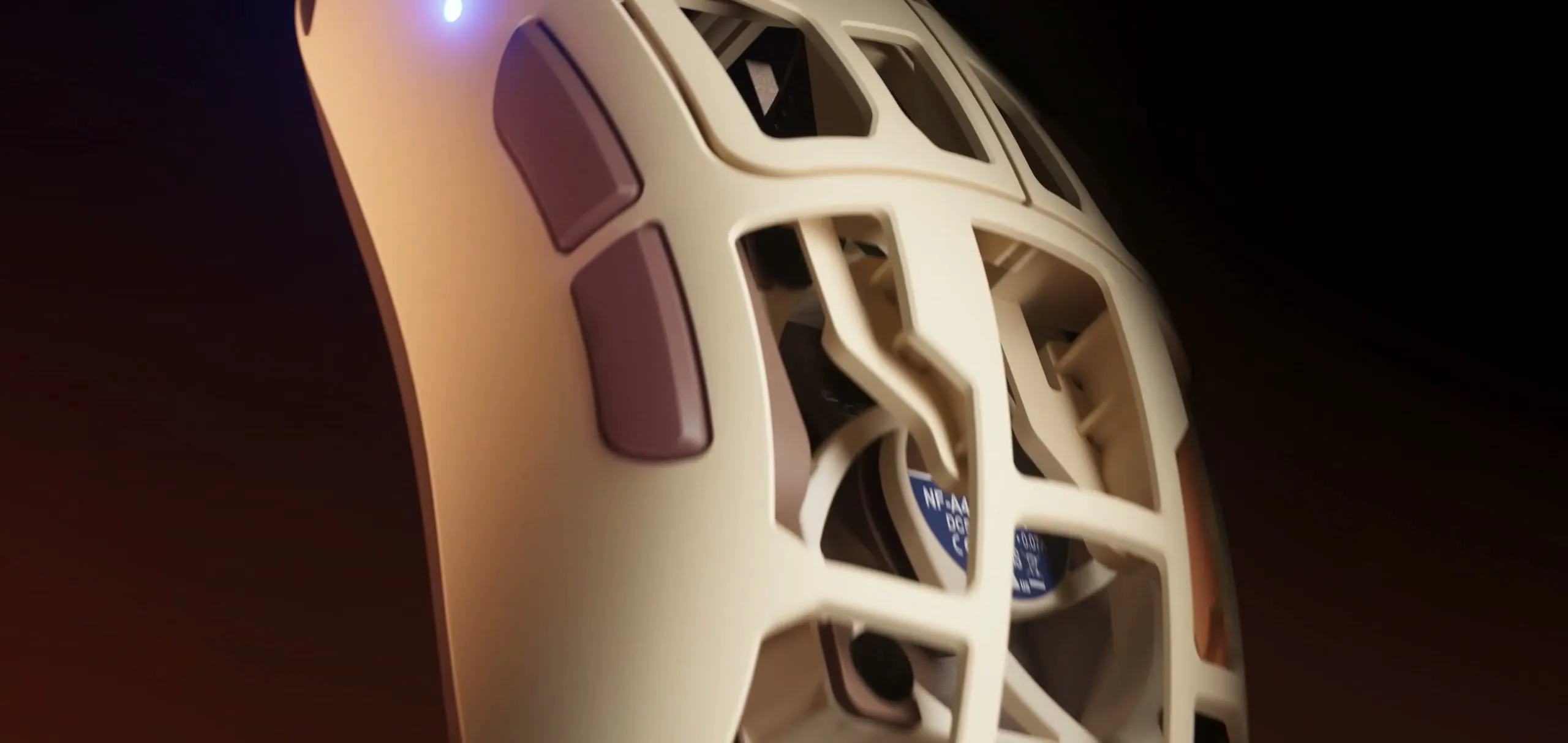 The side profile of the Feinmann F01 Noctua Edition with a ventilation grille and the visible Noctua fan