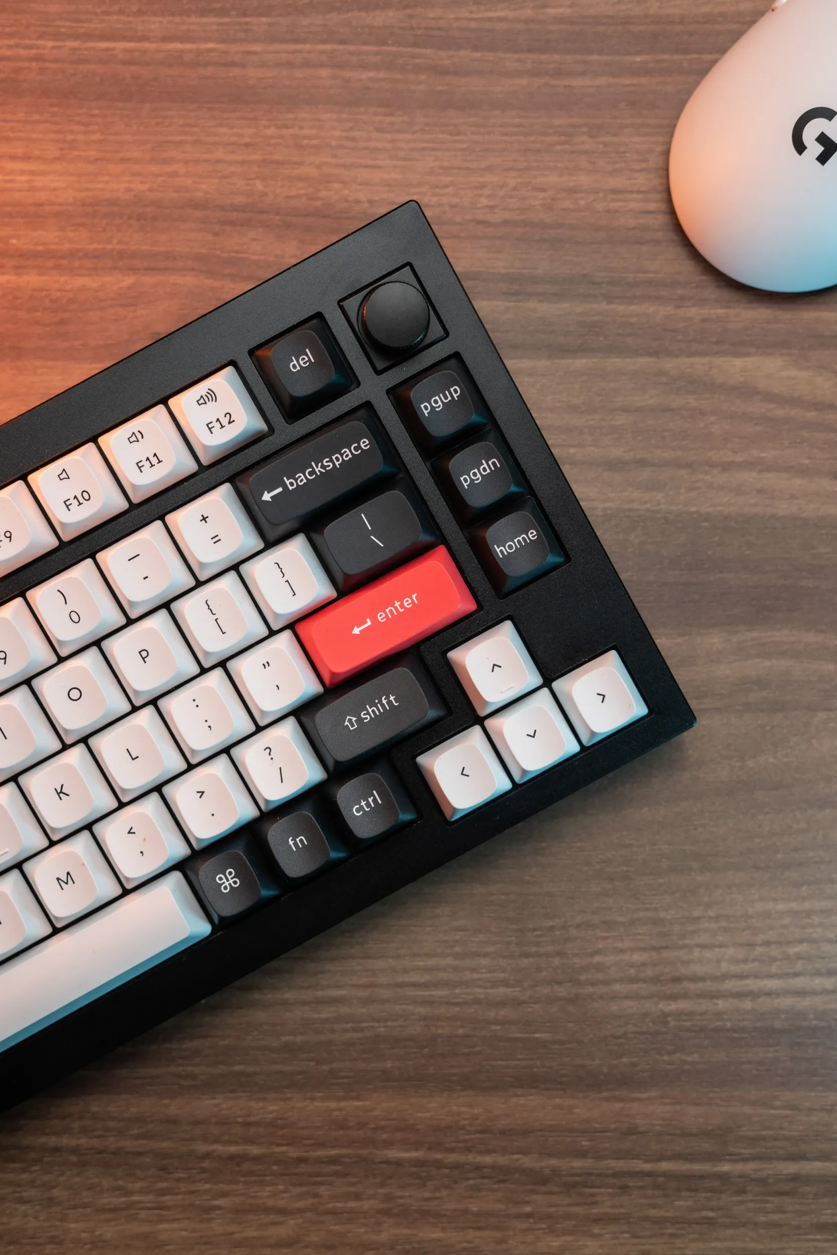 Close-up of the right side of the Keychron Q1 HE with knob, red enter key and arrow keys