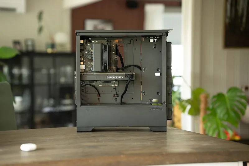 The server PC with its side panel off, showing the air cooler, motherboard and Dell OEM RTX 2080 Ti inside a big Phanteks case
