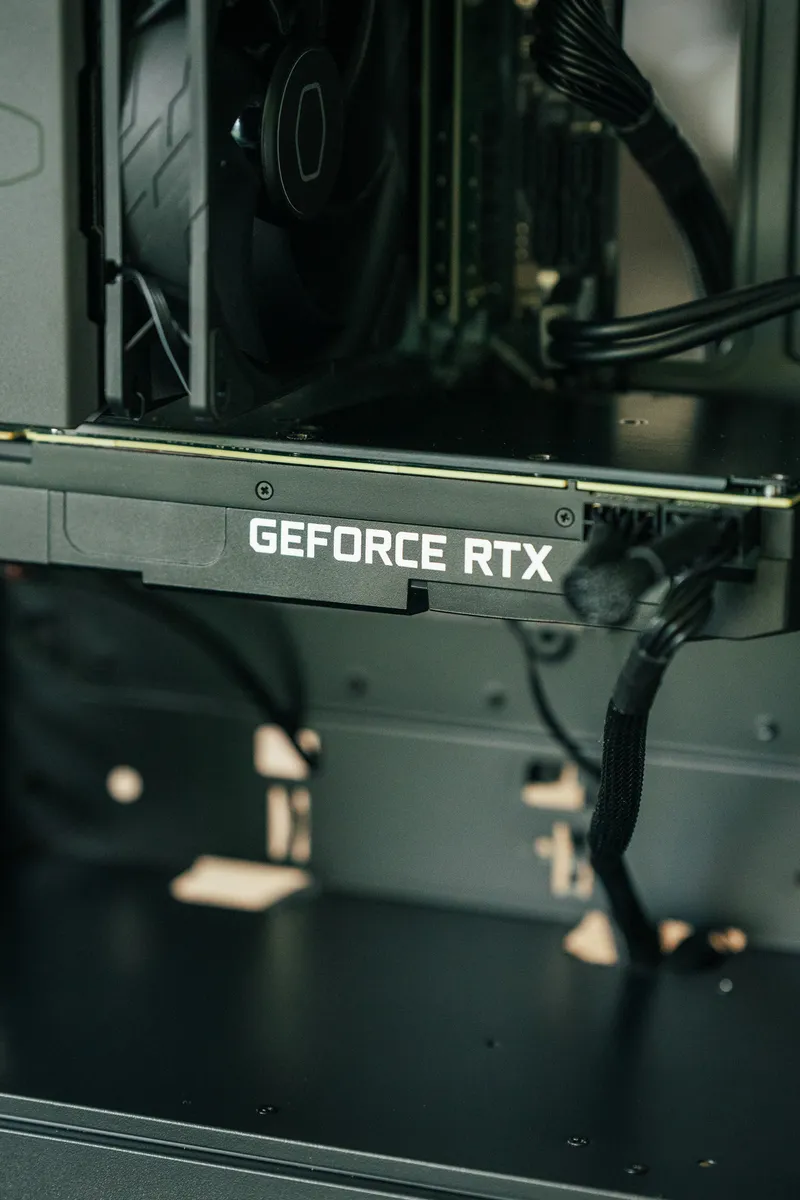 Close-up of the GeForce RTX badge on the 2080 Ti, with the CPU cooler and DDR4 memory above it
