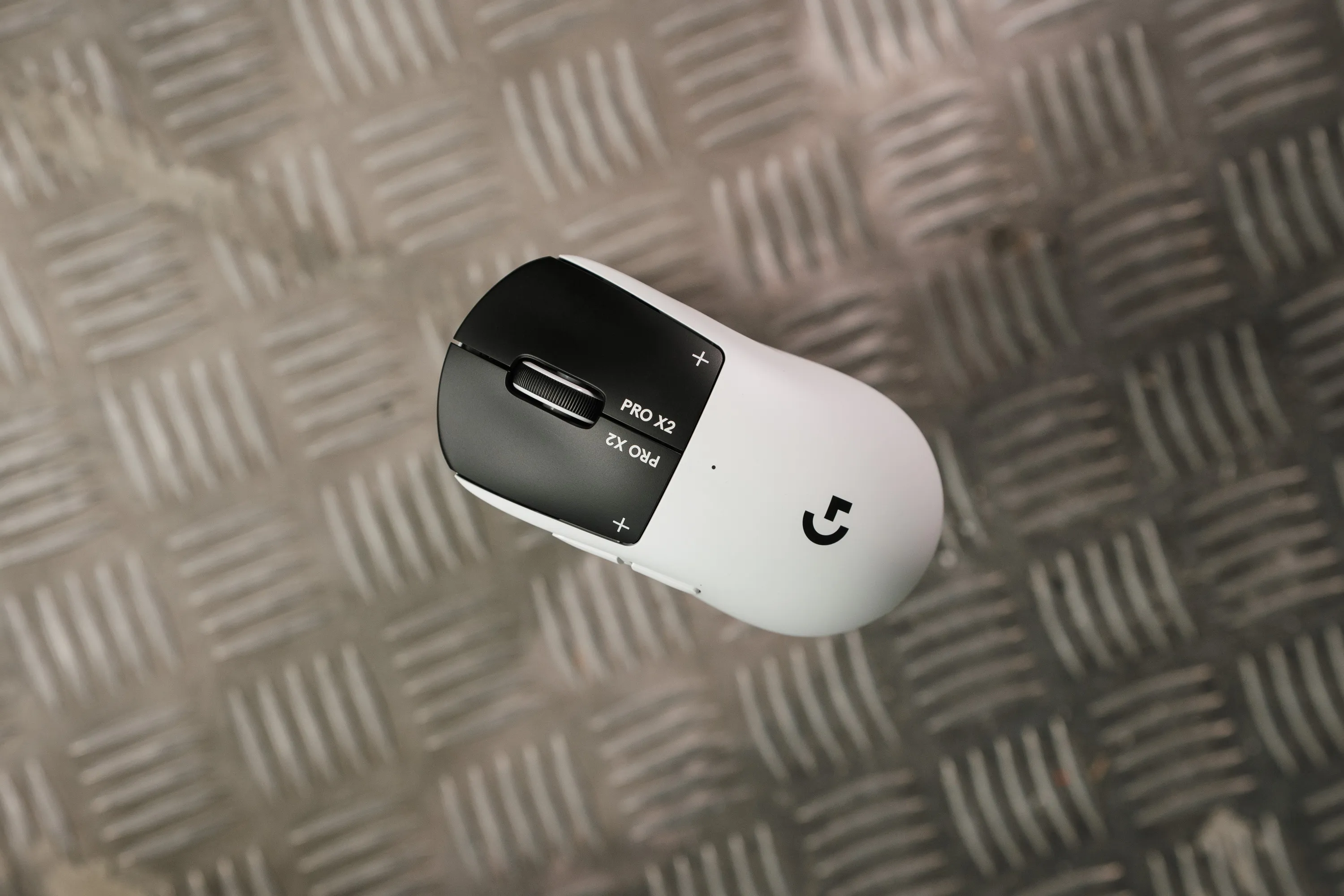 Logitech G Pro X2 Superstrike lying on a metal checker plate
